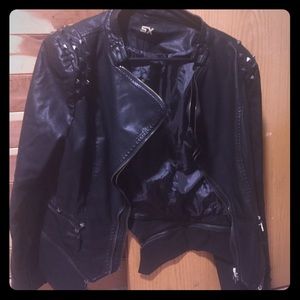 Women’s leather jacket never worn.